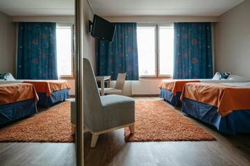 Фото номера Двухместный номер с 2 отдельными кроватями и сауной Отель Lapland Hotels Ylläskaltio г. Экясломполо 6