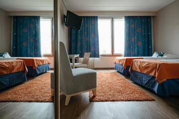Фото номера Двухместный номер с 2 отдельными кроватями и сауной Отель Lapland Hotels Ylläskaltio г. Экясломполо 5