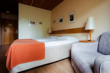 Фото номера Двухместный номер эконом-класса с 2 отдельными кроватями Отель Lapland Hotels Äkäshotelli г. Экясломполо 4