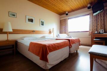 Фото номера Двухместный номер эконом-класса с 2 отдельными кроватями Отель Lapland Hotels Äkäshotelli г. Экясломполо 2
