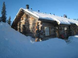 Фото Дома для отпуска Lost Inn Cabins г. Экясломполо