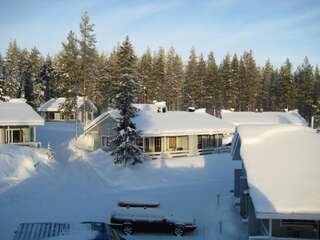 Фото Гостевой дом Kuerkaltio Holiday Village г. Экясломполо